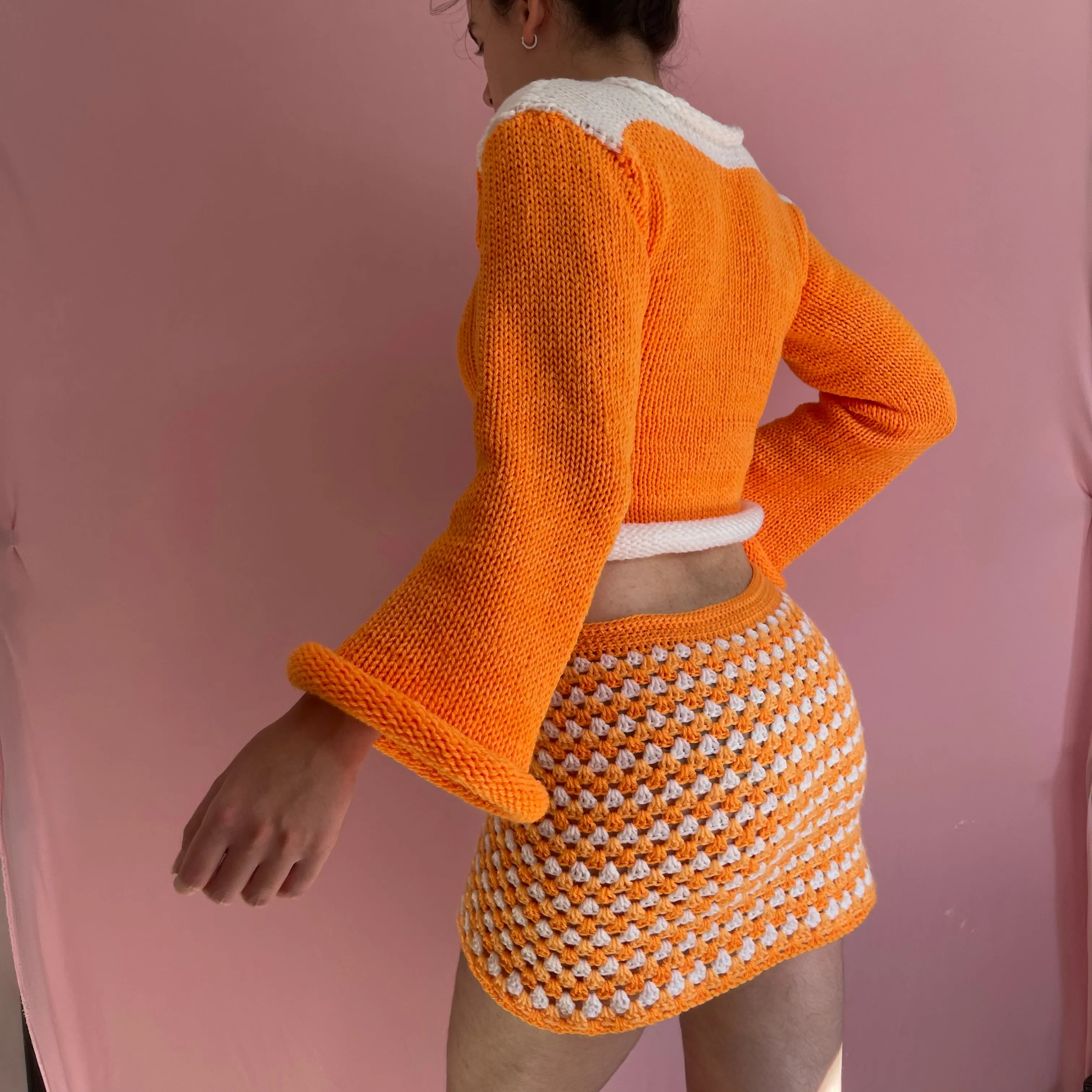 Handmade knitted colour block jumper in orange and white