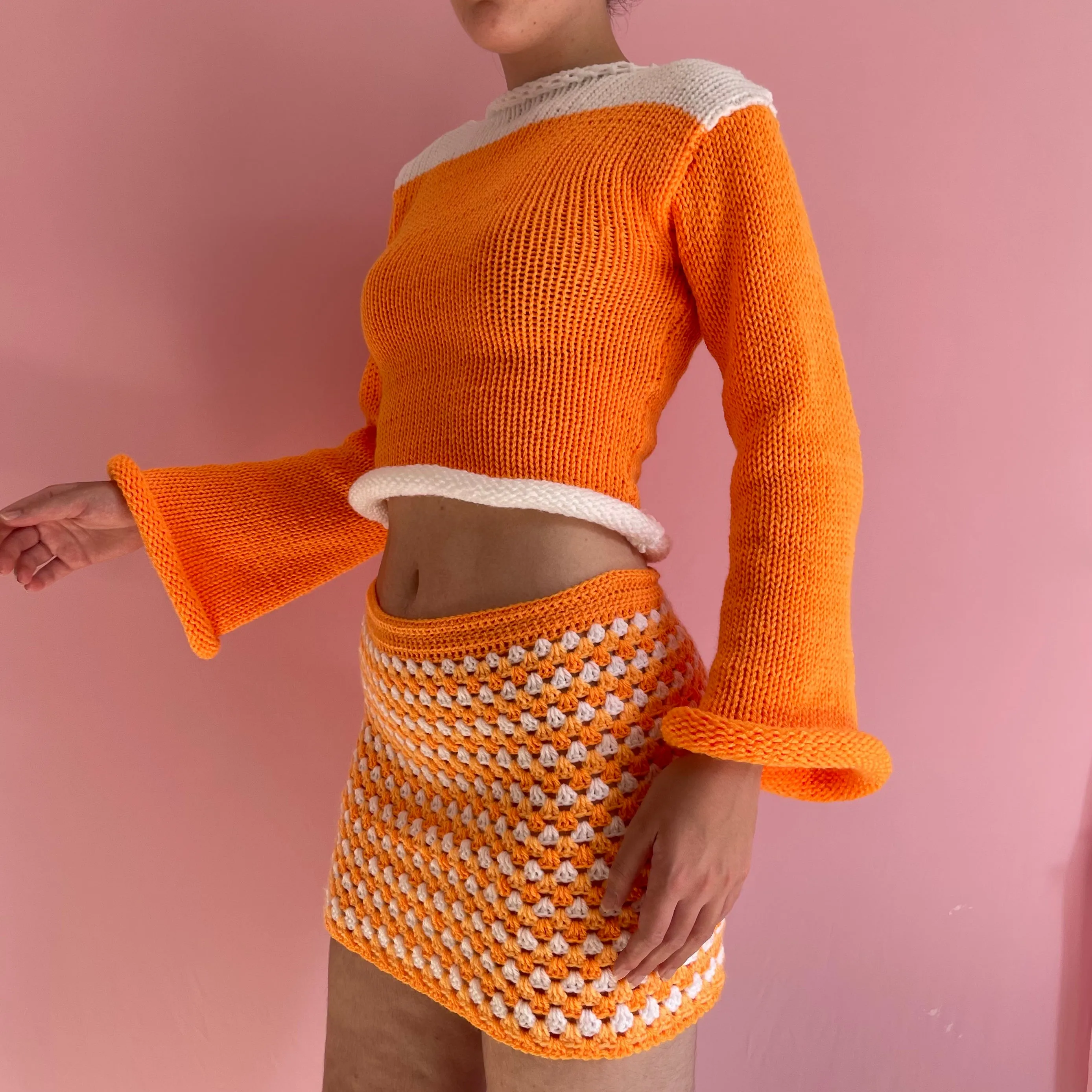 Handmade knitted colour block jumper in orange and white