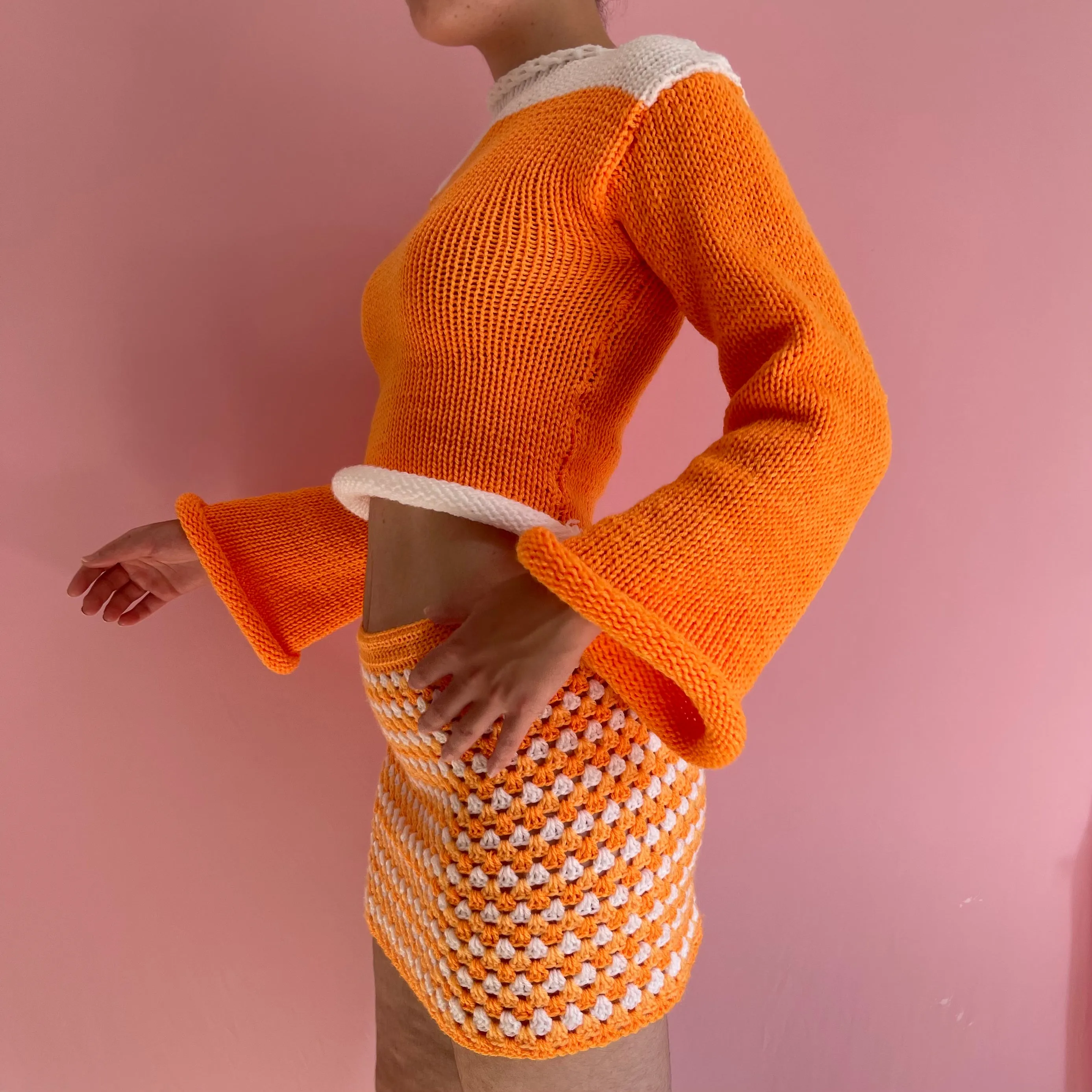 Handmade knitted colour block jumper in orange and white