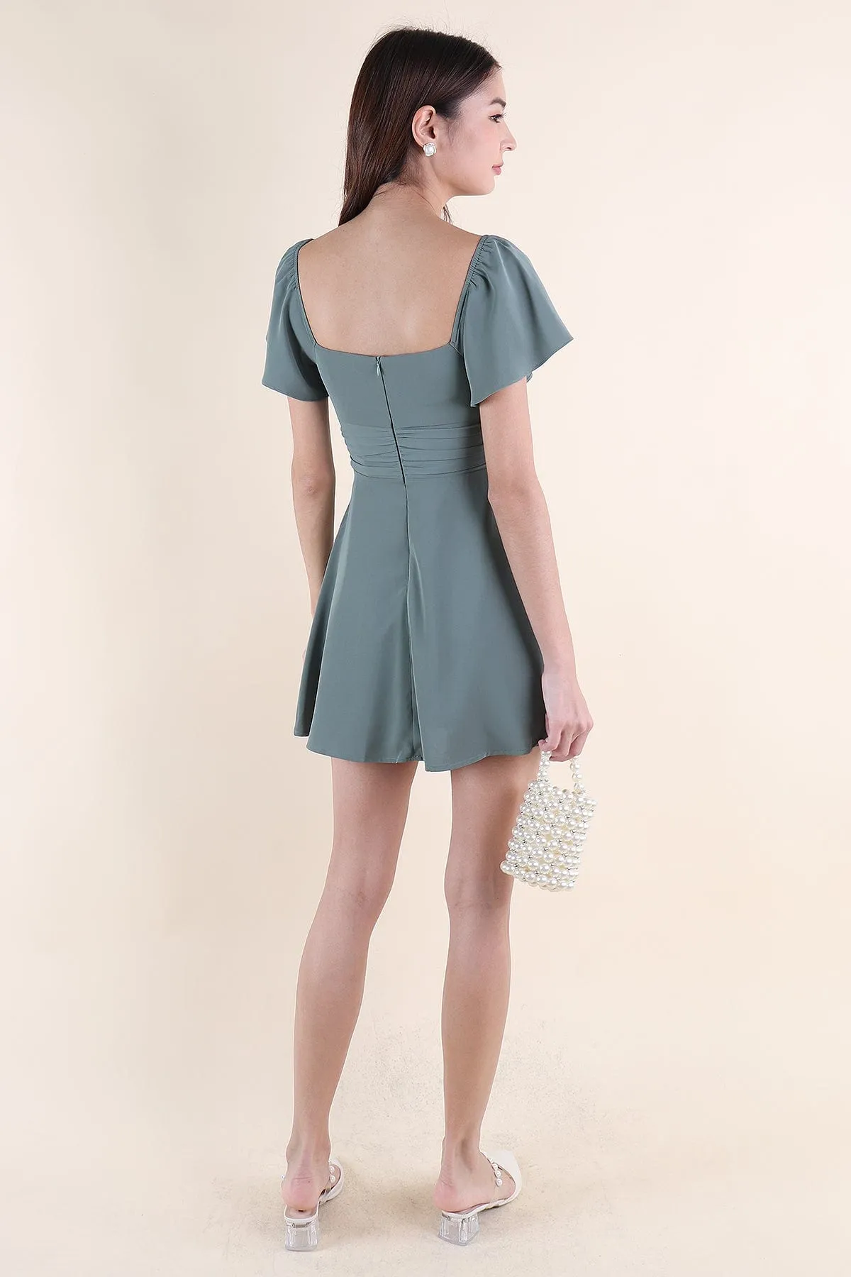 NEVEA RUCHED FLUTTER SLEEVE DRESS IN GREEN